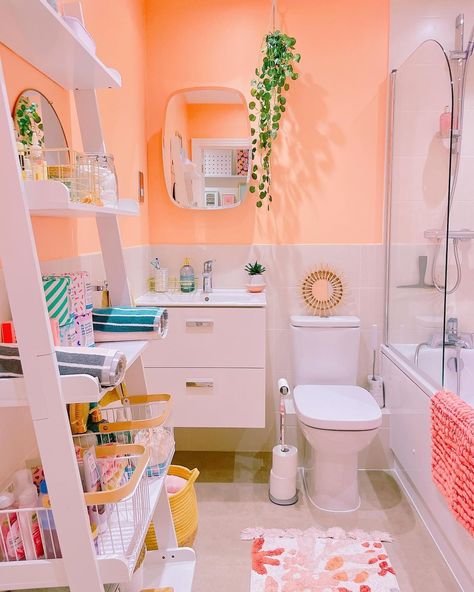 Rosie Dickens | 🐠 my skincare sanctuary, peachy paradise and toiletries utopia 🧴 my bathroom is all about fun patterns and colourful storage, who wants to… | Instagram Orange And Pink Bathroom Ideas, Tiny Colorful Bathroom, Preppy Small Bathroom, Fun Toilet, Light Color Bathroom Ideas, Bathroom Colourful, Colourful Small Bathroom, Pink Orange Bathroom, Orange Pink Bathroom