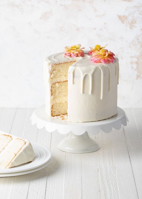 White Velvet Cake - Style Sweet White Chocolate Drip Cake, Moist Lemon Pound Cake, White Chocolate Drip, Whipped Buttercream Frosting, White Velvet Cake, Easy Chocolate Ganache, White Velvet Cakes, Strawberry Cake Filling, Buttercream Cake Designs