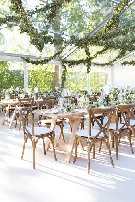 Rustic wooden tables with Paris Crossback Chairs. Made from reclaimed boards our trestle tables seat 8 guests per table, with 4 on each side or 10 guests per table using the table ends for additional guests. Paired with our rustic solid wood cross back chairs in this stunning marquee give simplicity and flair. Rustic Table And Chairs, Antique Wood Furniture, Marquee Wedding Decoration, Wooden Trestle Table, Cross Back Chair, Marquee Decoration, French Style Chairs, Trestle Tables, Wedding Marquee