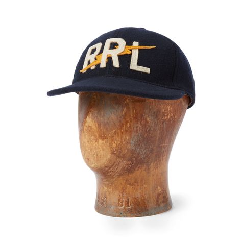 Made with wool-blend felt. "RRL" logo and a lightning bolt appliquéd on the front. Leather sweatband. Lined with satin. Signature green underbrim. Leather strap on the back with an antiqued brass buckle. Felt Baseball, Cap For Men, Cap Mens, Vintage Cap, Felt Ball, Brass Buckle, Lightning Bolt, Ball Cap, Ralph Lauren Men