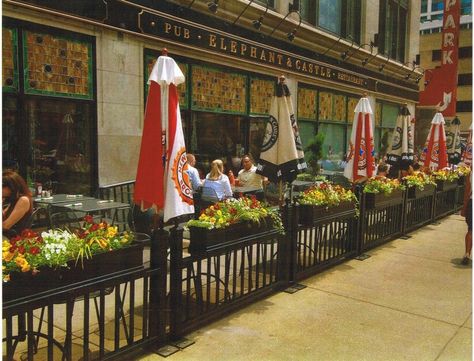 Nice box planters on fence.  Really a great way to attract people to your restaurant / café / pub or business! Restaurant Patio Planters, Restaurant Patio Flowers, Garden Partition, Outdoor Fence Decor, Castle Restaurant, Outdoor Restaurant Patio, Box Planters, Patio Railing, Container Restaurant