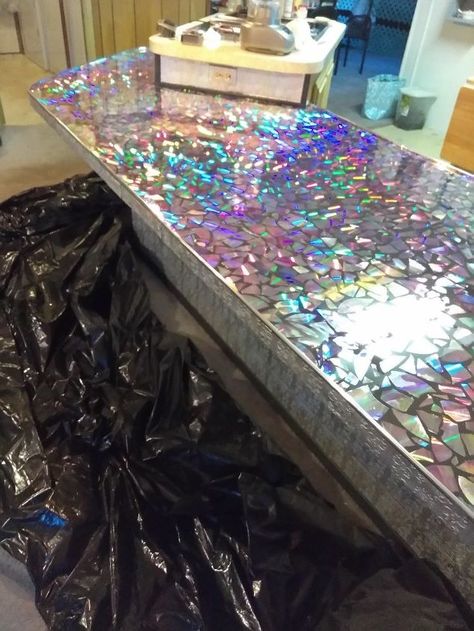 broken dvd countertop a labor of love Iridescent Countertop, Glitter Epoxy Countertop, Diy Concrete Counter, Faux Brick Backsplash, Faux Brick Panels, Old Cd, Diy Concrete Countertops, Brick Paneling, Brick Backsplash