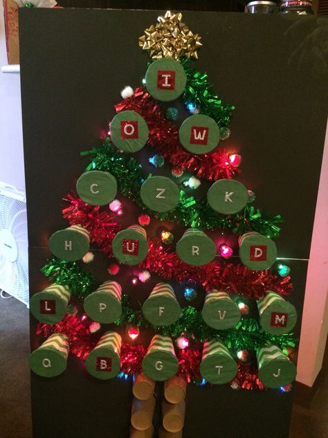 Christmas tree punch game! Punch Game, Christmas Punch Out Game, Punch A Prize Christmas, Tree Punch Game, Christmas Punch Board, Punch Box Diy, Christmas Tree Punch Game, Christmas Punch Tree Game, Christmas Tree Punch Out Game Prizes