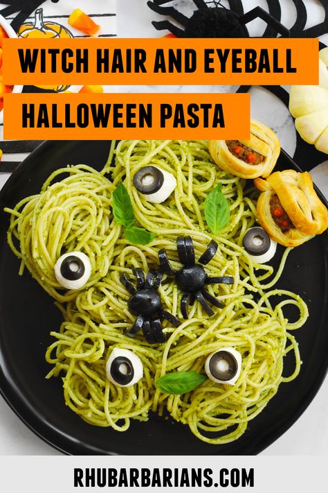 A photo of Halloween pasta with an orange and black text overlay that says, "witch hair and eyeball halloween pasta." Spooky Pasta, Halloween Potluck Recipes, Vegetarian Halloween, Spooky Spaghetti, Vegan Pesto Recipe, Vegan Halloween Food, Halloween Pasta, Halloween Potluck, Vegan Potluck