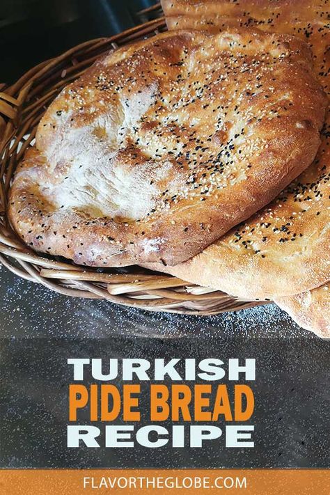 Traditional Turkish pide bread sprinkled with sesame seeds and sitting in a basket on a table sprinkled with salt Pide Bread Recipe, Turkish Pide Bread Recipe, Turkish Flatbread Recipe, Turkish Bread Recipe, Pide Recipe, Pide Bread, Turkish Flatbread, Turkish Pide, Turkish Bread