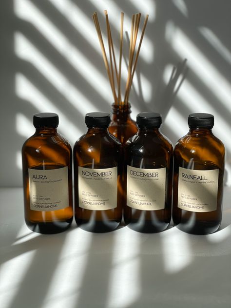 Our reed diffusers are a blend of 100% natural diffuser base and unique fragrance oils in an 8 oz amber apothecary-inspired bottle. Each diffuser contains 8 natural reed rattans lasting approximately 6 months. Amber bottles are 5.5" tall and reeds are 10" long. Shampoo Design, Amber Bottles, Amber Glass Bottles, Candle Packaging, Reed Diffusers, Unique Fragrance, Candle Business, Linen Spray, Fragrance Spray