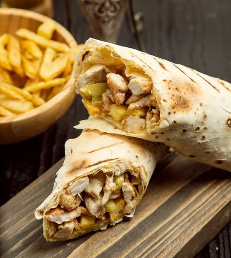 Chicken durum, shaurma with lavash and f... | Free Photo #Freepik #freephoto #shaurma #chicken-shawarma #chicken-doner #wrap Eat Aesthetic, Tacos Dorados, Shawarma Recipe, Doner Kebab, Photo Food, Chicken Shawarma, Halal Recipes, Burger Bar, Eastern Cuisine