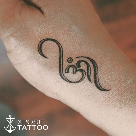 "Unlock your inner peace and embrace the power of the sacred symbol with this stunning om tattoo by . Each stroke represents a journey towards self-discovery and enlightenment. Let this powerful ink serve as a constant reminder to always stay grounded and connected with your higher self. #omtattoo #xposetattoos #innerpeace #selfdiscovery #professionaltattooartist" Higher Self Tattoo, Inner Peace Tattoo, Self Tattoo, Peace Tattoos, Tattoo Maker, Om Tattoo, Your Higher Self, Stay Grounded, Sacred Symbols