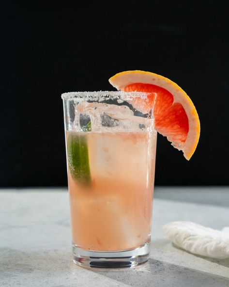 This cocktail’s got a unique name and a beautiful pale pink color! What's salty about it? The salt rim, which accentuates the sweet and sour flavors. It combines grapefruit juice with gin into one tangy and refreshing cocktail! It's perfect as a brunch drink or for happy hour. It’s got a light summery vibe, but it also works in winter when citrus abounds.Variation: Greyhound Cocktail (sans salt rim) Greyhound Cocktail, Citrus Cocktail, Best Gin Cocktails, Watermelon Cocktail, Grapefruit Cocktail, Best Summer Cocktails, Citrus Cocktails, Peach Sangria, Cocktails To Try