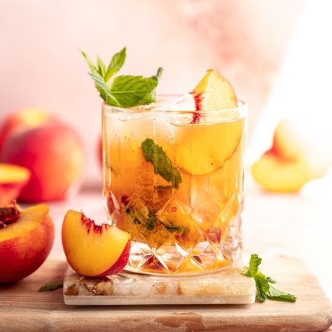 Sweet Bourbon Peach Smash, Peach Bourbon Punch, Peach Whiskey Smash Recipe, Hot Honey Bourbon Peach Slush, Bourbon Peach Smash Cocktail, Cooking With Bourbon, Mint Julep Recipe, Sweet Bourbon, Mint Cocktails