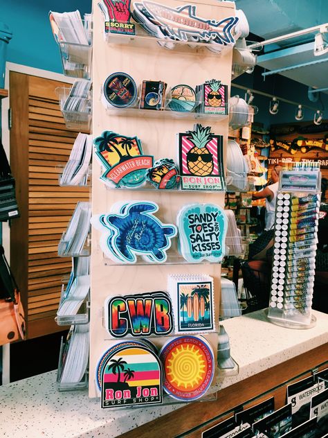 Stickers Display Booth, Surf Shop Aesthetic Interior, Surf Shop Decor, Surf Shop Interior Design, Beach Store Aesthetic, Surf Shop Design, Surf Shop Interior, Surf Shop Aesthetic, Stationery Store Design