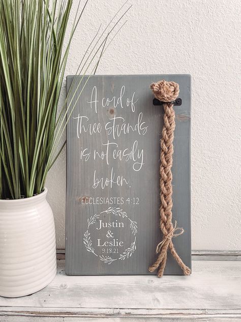 A Cord Of Three Strands Sign This sentimental sign makes for a wonderful alternative to a unity candle or unity sand ceremony! This would also be a great wedding or anniversary gift. **ADD COLORED CORDS: https://www.etsy.com/listing/746609595/add-colored-cotton-cords-to-order?ref=listing_published_alert Details: * Made with new pine wood *Hardware for hanging is attached to the back of sign *Actual measurements can vary up to 1/2 inch If you would like a custom order or are interested in a diffe Cord Of 3 Strands, Wedding Ceremony Sign, Wood Hardware, Unity Sand Ceremony, Cord Of Three Strands, Unity Sand, Spring Sewing, Catholic Decor, Ceremony Sign