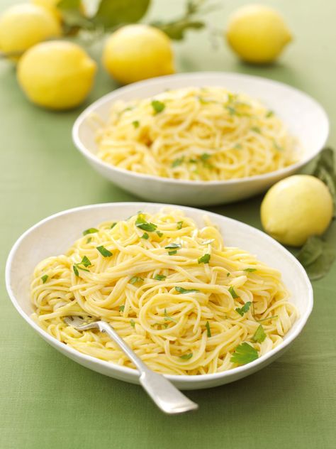 There was a time, years ago, when this was on my table pretty much whenever I had friends over for a lazy Saturday lunch. And I love it still. It’s simple and undemanding to make, and can equally offer summer sprightliness or winter comfort, and in summer you might certainly consider scattering over basil on serving, along with the parsley. The sauce itself (rather like the eggs in a carbonara) is not actually cooked, but warmed through as it’s tossed fragrantly with the hot pasta. I find when Lemon Linguini Pasta, Pasta With Ricotta And Lemon, Lemon Garlic Linguine Recipes, Quick Lemon Ricotta Pasta, Lemon Linguine, Lemony Linguine With Olives And Feta, Saturday Lunch, Lemon Pasta Recipes, Nigella Lawson Recipes