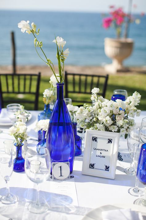 Photography: Kate Price Photography - katepricephotography.com  Read More: http://www.stylemepretty.com/destination-weddings/2014/10/01/fun-sayulita-mexico-wedding/ Cobalt Blue Vases, Blue Glass Centerpieces, Cobalt Blue Flowers, Blue Glass Wedding Decor, Cobalt Blue Centerpieces, Cobalt Blue Wedding Colors, Cobalt Blue Glass Decor, Cobalt Blue Vase Centerpieces, Blue Glass Wedding