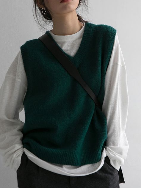 Great to layer over a collared shirt and pants for a smart-casual look. Perfect for cafe or campus dates. V-neck Relaxed fit Collared Shirt And Vest Outfit, Green Sweater Vest Outfits For Women, Short Sleeve Vest Outfits, Knit Vest Styling, Sweater Vest Button Up Outfit, Green Knit Vest Outfit, Dark Green Vest Outfit, Sweater Vest Business Casual, Pullover Vest Outfit