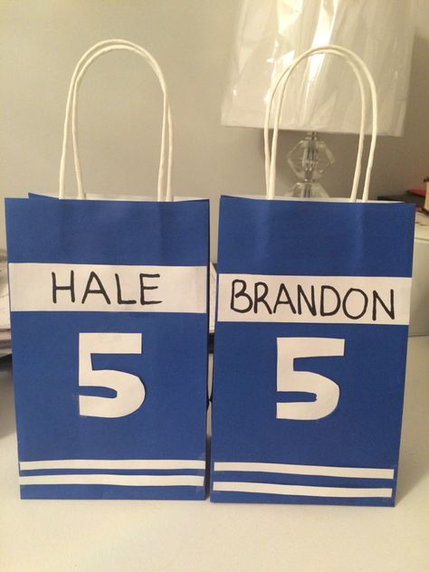 Hockey themed loot bags I made for my sons birthday party. Hockey Themed Party Favors, Ice Hockey Themed Party, Hockey Bday Party Ideas, Nhl Party Ideas, Hockey Holiday Party, Hockey Themed Birthday Party Decorations, Hockey Loot Bag Ideas, Nhl Birthday Party Ideas, Kids Hockey Birthday Party