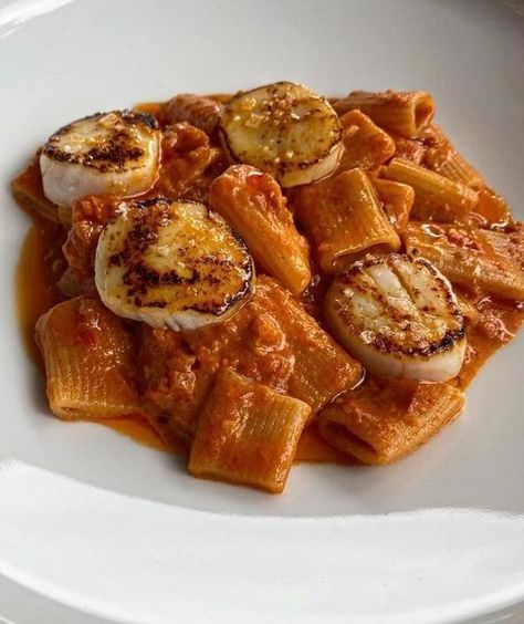 Spicy Scallop Rigatoni is a delightful and sophisticated dish that combines tender seafood with a rich, flavorful sauce. The recipe features succulent sea scallops and juicy shrimp, seared to perfection and then simmered in a savory tomato and mushroom sauce. The dish is elevated with the earthy taste of porcini mushrooms and the freshness of […] Nara Smith, Sea Scallops, Porcini Mushrooms, Mushroom Sauce, Rigatoni, Food Is Fuel, Italian Food, Beautiful Food, Pretty Food