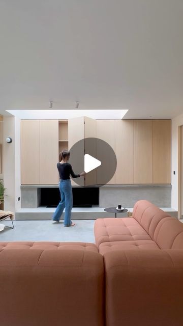 Sara Mungeam on Instagram: "H I D D E N  T V |   I was 100% that I didn’t want to be looking at a massive TV all the time in here (and it was going to be massive as the husband was choosing it!)…so, I designed these oversized cupboards to hide it. As you can see, we have yet to put the TV up…patience has definitely been a massive virtue on this build 😀…hopefully this week though we can start to watch tv in here.   So, what else lies behind these panel doors? We have one cupboard for general storage (we had to forego 2 others as we needed a fixed edge either side of the TV cupboard to put our Soss hinges into to allow the doors to fold back completely. Blimey, that was painful working out how to achieve that. Who knew hinges would be so damned tricky?! Then, to the right, we will have a dr Sliding Tv Cabinet, Tv Doors Hide Tv, Media Wall Cupboard Doors, Hidden Tv Storage, Hide Tv On Wall, Hidden Tv Over Fireplace, Hide Tv Over Fireplace, Soss Hinges, Hidden Tv Cabinet