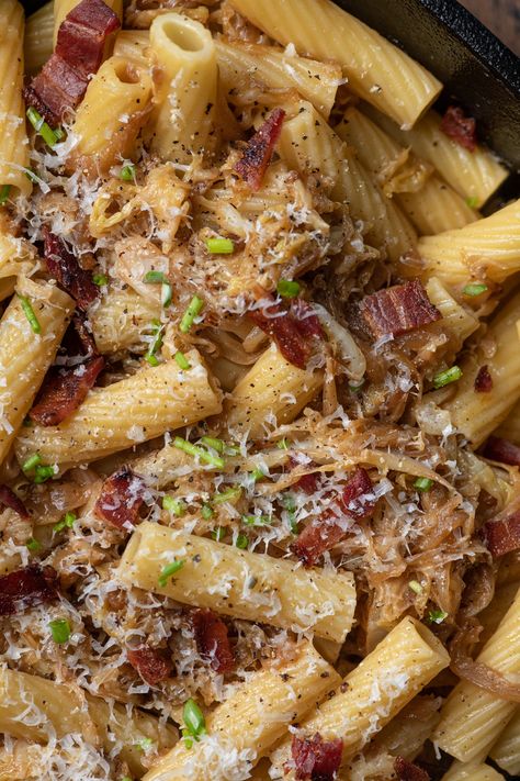 A bowl of rigatoni pasta with bacon bits, caramelized cabbage and topped with cheese Egg Noodles And Cabbage, Egg Noodle Cream Of Mushroom, Onion Mushroom Pasta, Mushroom And Egg Noodles, Haluski Fried Cabbage And Noodles, Haluski Recipe, Cabbage And Noodles, Turkey Glaze, Rigatoni Pasta