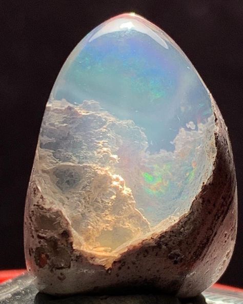 Opal with a landscape of opal mines Crystal Vibes, Crystal Aesthetic, Pretty Rocks, Cool Rocks, 수채화 그림, Mineral Stone, Rocks And Gems, Minerals And Gemstones, Gems And Minerals