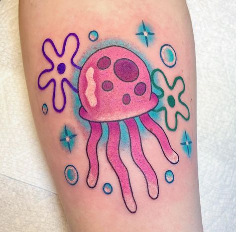 jellyfish from my spongebob flash for bee 🪼✨ thank you so much for your continued support friend! <3 and thanks for looking y’all! DM TO BOOK 🤓👍🏻💕 - - - - - #spongebobtattoo #spongebobsquarepants #jellyfishtattoo #tattooapprentice #omahatattoos #iowatattooartist Spongebob Tattoo Flash, Spongebob Jellyfish Tattoo, Spongebob Tattoo Ideas, Spongebob Jellyfish, Spongebob Tattoo, Nerdy Tattoos, Pop Art Tattoos, Jellyfish Tattoo, Movie Tattoos