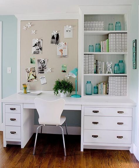 Beautiful white built in desk is fitted with vintage nickel pulls and seats a West Elm Scoop Back Chair positioned facing built in white framed gray linen pin board fixed beside styled shelves decorated with turquoise accents perfectly complementing a turquoise blue desk lamp and pale blue walls. Home Office With Built Ins, White Desk, Teen Girl Bedroom, Craft Room Office, Built In Desk, Home Office Space, Home Desk, Home Office Organization, Office Inspiration