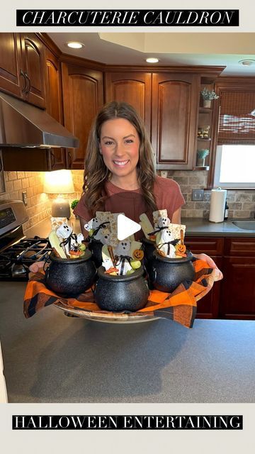 Tara Panasiuk on Instagram: "Halloween Charcuterie Cauldrons 🖤🧡 Comment “CAULDRON” to be sent the items used here as well as a full list of the food I used 🥰

They are so fun for your Halloween entertaining & parties 👻 You can customize them however you would like! 

#entertainingathome #partyideas #halloween #halloweenideas #halloweenparty" Cauldron Food Ideas, Charcuterie Halloween Cups, Cauldron Charcuterie, Mini Cauldron Ideas, Halloween Charcuterie Cups, Halloween Cauldron Ideas, Sharkcoochie Boards, Halloween Food Display, Halloween Dinner Party Menu