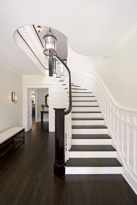 Remodelaholic | Choosing Paint Colors that Work with Wood Trim and Floors Black And White Staircase, Stairs Trim, White Staircase, Hall Ideas, Traditional Staircase, Stair Rail, Hardwood Floors Dark, Floor Stain, Best White Paint