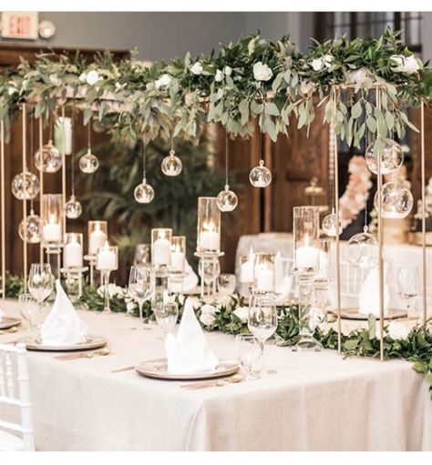 Wedding Table Hanging Decorations, Hanging Wedding Centerpieces, Overhead Wedding Centerpieces, Hanging Centrepieces Wedding, Hanging Orbs Wedding, Overhead Table Decorations, Flowers Cascading Off Table, Square Floral Arch, Over The Table Rod Decor Wedding