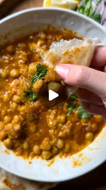 Sara l Nutrient Matters on Instagram: "If you’re looking for a plant-based meal to add to your weekly rotation, chana masala is a classic that just about anyone can enjoy 🙌🏽 This also stores incredibly well in the fridge, making it perfect for a quick lunch throughout the week! 

Recipe ⬇️
2 large tomatoes 
2 tbsp Ghee 
1 Red onion 
2 cardamon pods 
1 bay leaf 
4 (large) garlic cloves (minced)
2” ginger (grated)
1 tsp Ground coriander 
1 tsp garam malasa 
1 tsp Red Chili powder 
1 tsp Paprika 
1 tsp curry powder 
1/2 tsp Cumin AND 
1/4 tsp turmeric 
Tomato pure (1.5-2 cups tomato liquid)
Salt & pepper 
1 can chickpeas 
1 cup water 

Garnish & toppings: 
Heavy cream 
Cilantro 
Lemon juice 
Red onion (slices)" Dinner Recipes Vegetarian Indian, Indian Lunch Recipes, Curry Base, Chana Masala Recipe, Indian Cuisine Recipes, Lunch Recipes Indian, Indian Dinner Recipes, Curry Recipes Indian, Tasty Vegetarian Recipes