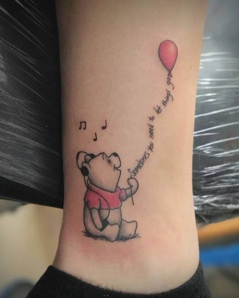 101 Amazing Winnie The Pooh Tattoo Designs You Need To See! 51 Outsons Winnie The Pooh Minimalist Tattoo, Winnie The Pooh Tattoos Small, Winnie The Pooh Inspired Tattoos, Winnie The Pooh With Balloon Tattoo, Tiny Winnie The Pooh Tattoo, Winny The Pooh Tattoos, Cute Winnie The Pooh Tattoos, Winnie The Pooh Memorial Tattoo, Winnie The Pooh Balloon Tattoo