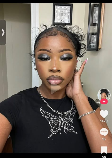 Beauty Marks On Face Makeup, Metallic Makeup Black Women, Siren Eye Makeup Black Women, Festival Makeup Black Women, Rockstar Makeup Black Women, Concert Makeup Black Women, Sliver Makeup Black Women, Metal Makeup Looks, Black Makeup Looks Black Women