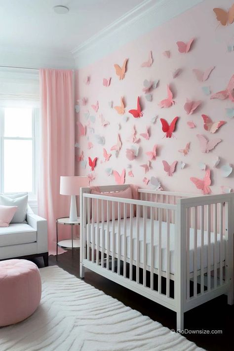 Go the extra mile and use a 3D design like this nursery with a pastel pink wall with fluttering butterflies distributed around the space. Butterfly Nursery Themes, Butterfly Baby Room, Twin Nursery Room, Organization Nursery, Pink Baby Nursery, Furniture Nursery, Girl Nurseries, Closet Nursery