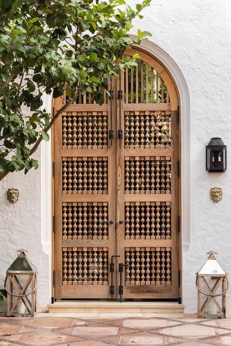 Fairfax & Sammons | La Claridad Spanish Double Doors, Mediterranean Front Door, Mediterranean Front Doors, Mediterranean Doors, Iron Balcony Railing, Iron Balcony, Entrance Door Design, Spanish Architecture, Entrance Doors