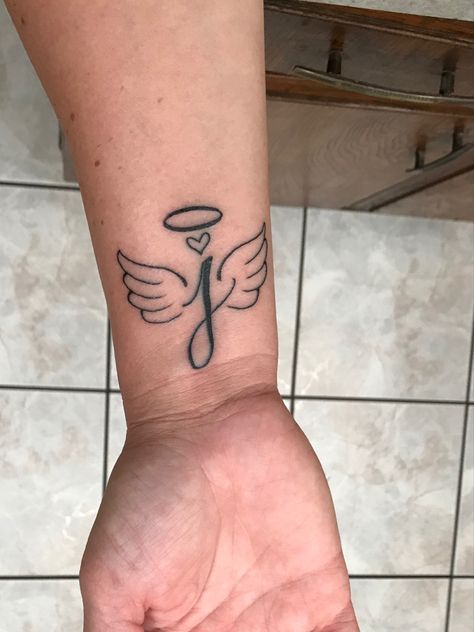 Friend Memorial Tattoos, Wings Tattoos, Angel Wings Halo, Memorial Tattoo Quotes, Wrist Tattoos Girls, Memorial Tattoo Designs, Cousin Tattoos, Rip Tattoo, Friends Tattoo