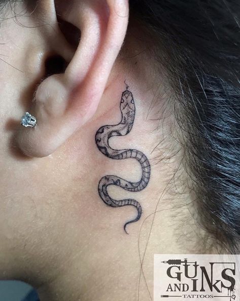 #snaketattoo #artistvikaskasbe #gunsandinkstattoos #hyderabadtattoos Back Snake Tattoo, Tattoo 101, Small Snake Tattoo, Small Cross Tattoo, Behind The Ear Tattoo, Behind Ear Tattoos, Semicolon Tattoo, Snake Tattoo Design, Crown Tattoo