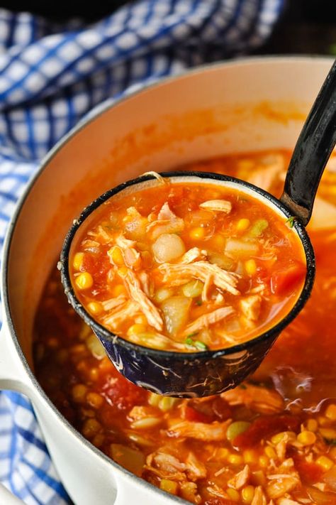 A pride and joy of Virginia culture, Brunswick Stew is a Southern classic that has been enjoyed for hundreds of years! The chicken and tomato-based dish is full of corn, potatoes and beans for a hearty, satisfying and delicious meal. Serve a warm bowl with a side of cornbread for an easy dinner that the whole family will love! Chicken Stew Tomato Base, Brunswick Stew Chicken, Virginia Brunswick Stew Recipe, Southern Brunswick Stew Recipe, Chicken Brunswick Stew Recipe, Southern Chicken Stew Recipe, Southern Chicken Stew, Brunswick Stew Recipe, Pork Crockpot Recipes