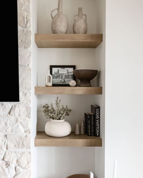 Can you tell we love a styled shelf?⁠ Display your favorite decor pieces or keep everyday essentials within easy reach. Which of these would you want in your home? ⁠ ⁠⠀⠀⠀⠀⠀⠀⠀⠀⠀⁠ 🖤 Alyssa Lane⁠ 🌷 Home Plate Hideaway⁠ 🕯️ Fairway Retreat⁠ 🧺 One Hundred Hills⁠ 🪞 Montevista ⁠ 📖 Alyssa Lane⁠ ⁠⠀⠀⠀⠀⠀⠀⠀⠀⠀⁠ Let us know your emoji pick down below! pc: @lifecreated #livingwithlolo⁠ ⠀⠀⠀⠀⠀⠀⠀⠀⠀⁠ #azdesign #arizonadesigner #scottsdaleinteriordesigner #luxeathome Small Floating Shelf Decor, Shelf Decor Living Room Minimalist, Floating Shelf Styling Living Room, Shelf Decor Living Room Modern, Living Room Floating Shelf Decor, Minimalist Shelf Styling, Floating Shelf Decor Living Room, Minimal Shelf Decor, Neutral Shelf Decor