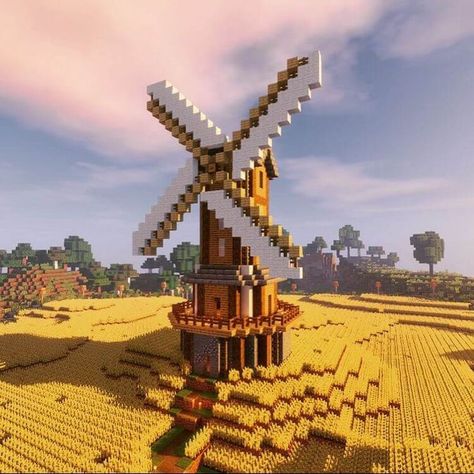 This Minecraft windmill is from an old singleplayer world known as Survival Experience. These pictures show the windmill and farm area in the world. Minecraft Windmill Design, Chalet Minecraft, Villa Minecraft, Construction Minecraft, Case Minecraft, Minecraft Statues, Rumah Minecraft Sederhana, Minecraft Structures, Bangunan Minecraft