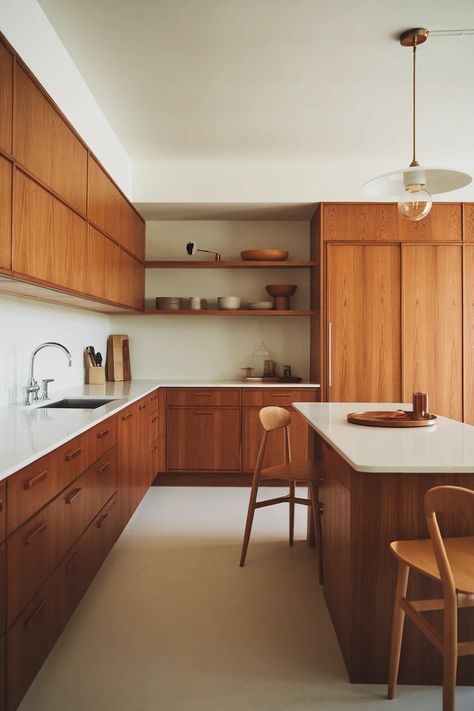 30 Stylish Mid-Century Modern Kitchen Design Ideas You’ll Love - The Ivy Kitchen Blog Mcm Kitchen With Island, Wood Modern Kitchen Design, Mid Century Interior Design Kitchen, Flooring For Small Spaces, Kitchen Island Mid Century Modern, Mid Century Home Remodel, Retro Chic Interior Design, Mid Century Kitchen Flooring, Mid Century Modern Update