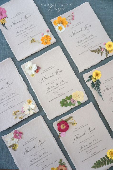 Maddie Laidig Designs creates exquisite handmade invitations featuring real pressed flowers, adding a touch of natural beauty to your special day. Each wedding invitation is carefully crafted with delicate, pressed blooms, making every piece unique and filled with charm. Perfect for nature-inspired weddings, these one-of-a-kind invitations capture the essence of your love story and set the tone for an unforgettable celebration. Custom Wedding Invitation Designer: @maddielaidigdesigns Pressed Flower Wedding Invitations, Pressed Flower Wedding, Photos For Wedding, Paper Wedding Invitations, Handmade Invitations, Nature Inspired Wedding, Handmade Wedding Invitations, Flower Handmade, Flower Wedding Invitation