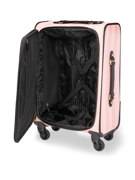 Keep calm and carry on. Keep your getaway essentials packed and organized with this rolling carry-on suitcase. In our iconic signature stripe finish. Main pocket fits: Multiple outfits, a beauty bag and all getaway essentials1 exterior zip pocket1 interior mesh zip pocket2 interior mesh side wall pocketsMeasures: 14” L x 8” D x 21.25” HImported nylon and polyurethane Carryon Suitcase, Victoria Paris, Travel Baggage, Suitcase Bag, Carry On Suitcase, Side Wall, Pretty Bags, Makeup Bags Travel, Carry On Luggage