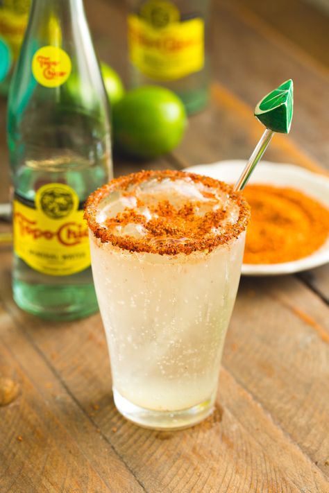 Agua mineral preparada is one of my must-have summer drinks. Agua mineral, fresh lime juice and plenty of Tajin combine perfectly to create a refreshing cooler that helps to beat the Texas heat. #sweetlifebake #sweetlife #sweetliferecipes | sweetlifebake.com @sweetlifebake Mineral Water Drinks, Tajin Recipes, Michelada Recipe, Virgin Drinks, Mexican Drinks, Michelada, Mixed Drinks Recipes, Tamarindo, Latin Food