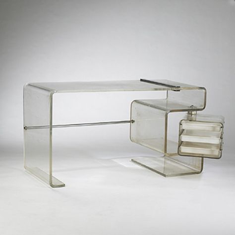 1970s desk USA acrylic, stainless steel 56.5 w x 23.75 d x 30 h inches.This desk features a swiveling drawer case containing three sliding drawers. s2 70s Furniture, Interior Design Minimalist, Home Office Inspiration, Acrylic Furniture, Decor Minimalist, Century Furniture, Furniture Inspiration, Interior Inspo, Interior Furniture