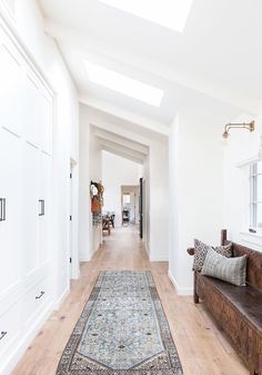 Gorgeous hallway. Decoration Hall, Entrance Way, Front Entryway, Long Hallway, Amber Interiors, Wood Flooring, Where The Heart Is, White Walls, House Inspiration