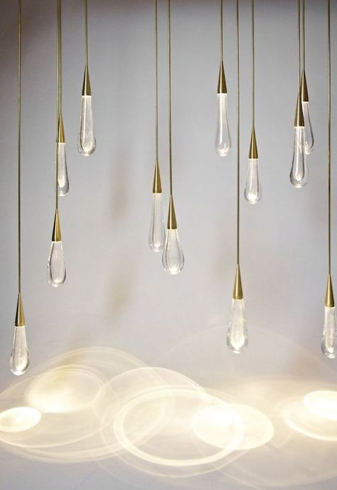 More than 100 brilliant lighting design ideas you need to see – how to use lighting as a statement piece in your interior design project | www.bocadolobo.com #homedecorideas #homedecor #decorations #housedecoration #luxuryfurniture #luxurybrands #roomdesign #interiordesign #productdesign #topinteriordesigners #exclusivedesign #luxuryhouses #luxuryhomes #luxurylifestyle #livingroom #diningroom #bedroom #luxurybathrooms #interiors #bestinteriors #furniture #luxury #luxurious #designinspirations #m Teardrop Lighting, Light Bulbs Hanging, Lightning Ideas, Blitz Design, Light Ideas, Deco Luminaire, Light Sculpture, Commercial Space, Creative Lighting