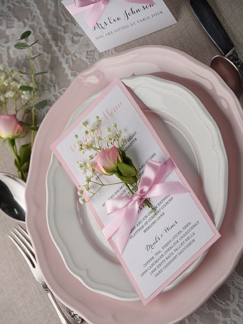 Pink wedding menu See more here Contact: Service - Paper Goods & Calligraphy Website - 4lovepolkadots.com Aesthetic Menu Design Ideas, Pale Pink Table Setting, Pink Bow Table Setting, Pink Wedding Aesthetic, Light Pink Napkins Wedding, Pink Wedding Menu, Wedding Name Place Cards Pink, Pink Wedding Menu Cards, Pink Table Settings