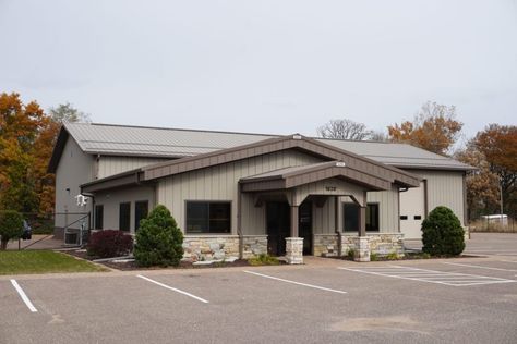 Built in 2017, this metal machine shed with an attached office would be perfect for any small business. The shop in the back can be steel-lined and insulated to keep your employees warm in the winter. The attached office with a deep fascia overhang and porch makes for great curb appeal. If this building does not fit your business, perhaps it would serve as a personal office with an attached storage building for your RV, boat or luxury car. Metal Building Boutique, Metal Buildings For Business, Metal Building For Business, Metal Office Building Designs, Metal Building With Office Space, Metal Building Store Front Ideas, Metal Building Business Exterior, Steel Office Building, Commercial Metal Building