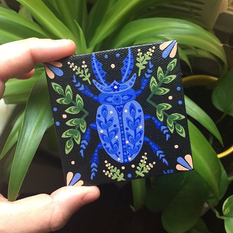 Add a pop of blue to any room in your home with one-of-a-kind hand-painted beetle canvas!   This acrylic painting features my trademark leaves & flowers in the background and is made just for you!  Includes satin varnish for water resistance & durability Painting Gift Ideas, Book Paintings, Wood Cookies, Hippie Painting, Cute Canvas Paintings, Christmas Lunch, Canvas Painting Designs, Cute Paintings, Small Canvas Art