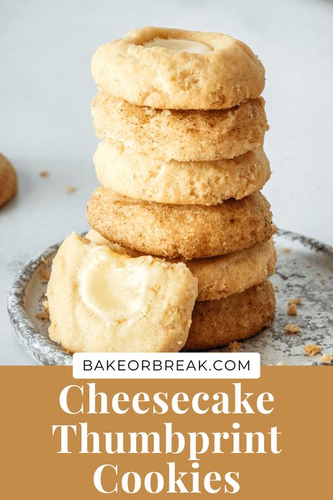 Cheesecake Thumbprint Cookies are soft cookies filled with sweet cheesecake. Roll them in cinnamon-sugar for a tasty variation. Thumbprint Cheesecake Cookies, Cinnamon Thumbprint Cookies, Cheesecake Thumbprint Cookies, Thumbprint Cookie Recipe, Tooth Cookies, Cheesecake Cookies Recipes, Thumbprint Cookie, Everything Autumn, Thumbprint Cookies Recipe